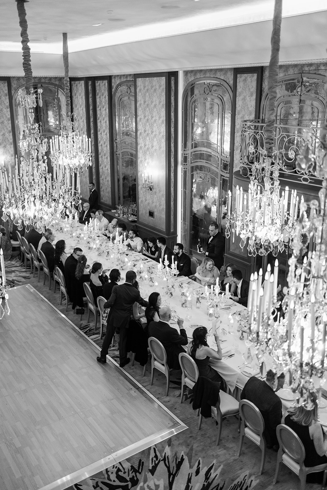 Overhead view of wedding reception tables inside Hôtel Plaza Athénée in Paris